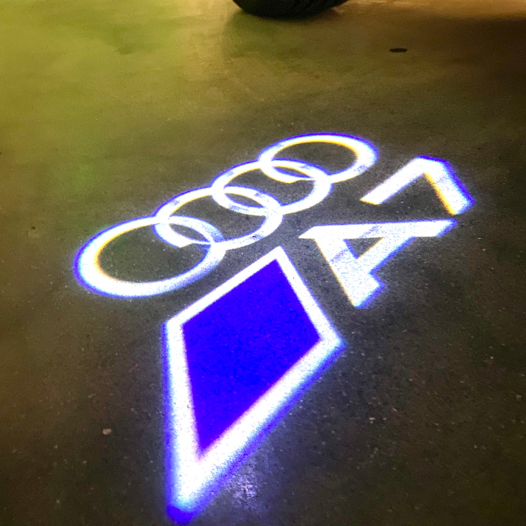 AUDI LOGO PROJECTOT LIGHTS Nr.120 (الكمية 1 = 2 Logo Films /2 أضواء الباب)