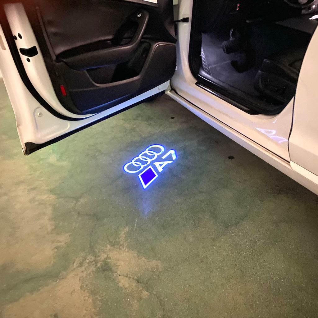 AUDI LOGO PROJECTOT LIGHTS Nr.120 (الكمية 1 = 2 Logo Films /2 أضواء الباب)