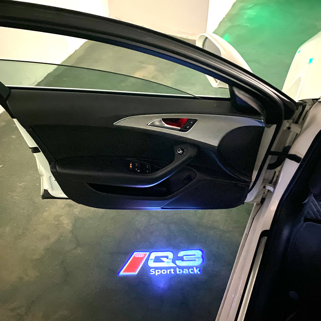 AUDI LOGO PROJECTOT LIGHTS Nr.120 (الكمية 1 = 2 Logo Films /2 أضواء الباب)