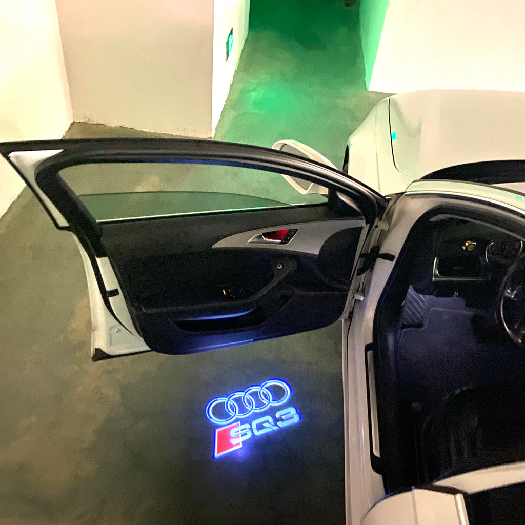 AUDI LOGO PROJECTOT LIGHTS Nr.120 (الكمية 1 = 2 Logo Films /2 أضواء الباب)