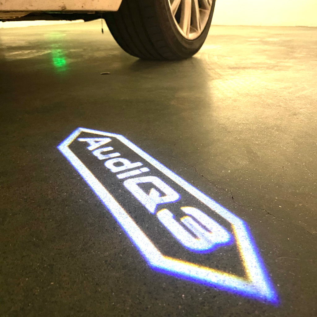 AUDI LOGO PROJECTOT LIGHTS Nr.120 (الكمية 1 = 2 Logo Films /2 أضواء الباب)