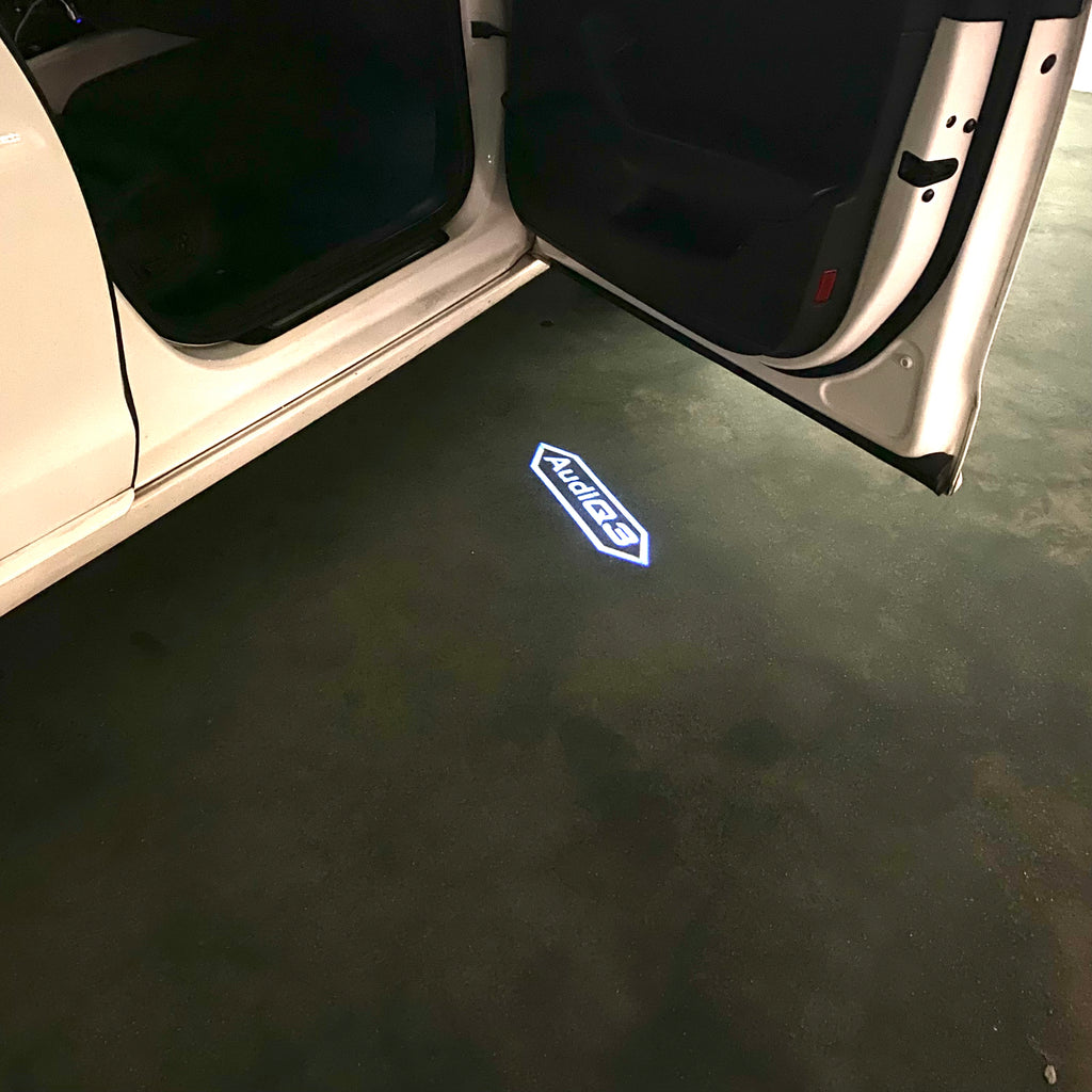 AUDI LOGO PROJECTOT LIGHTS Nr.120 (الكمية 1 = 2 Logo Films /2 أضواء الباب)