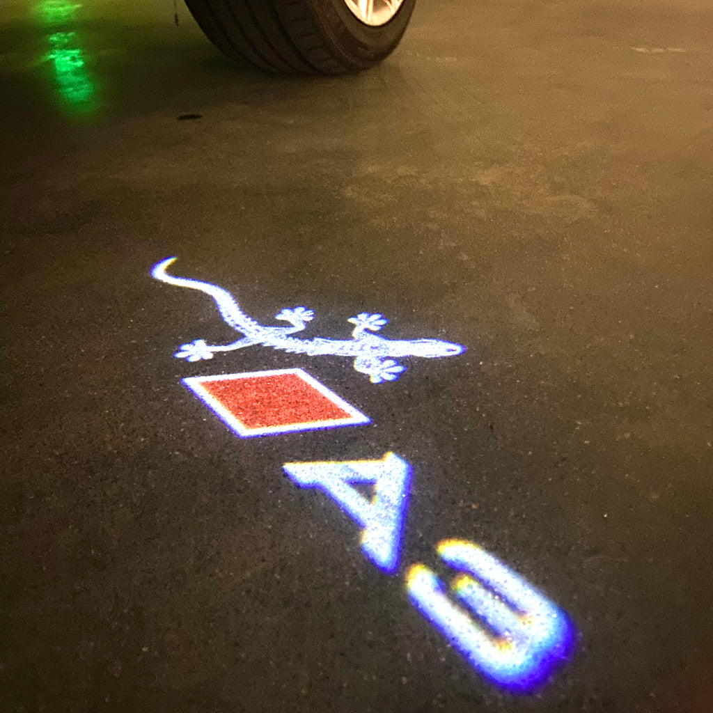 AUDI LOGO PROJECTOT LIGHTS Nr.120 (الكمية 1 = 2 Logo Films /2 أضواء الباب)