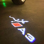 AUDI LOGO PROJECTOT LIGHTS Nr.120 (الكمية 1 = 2 Logo Films /2 أضواء الباب)