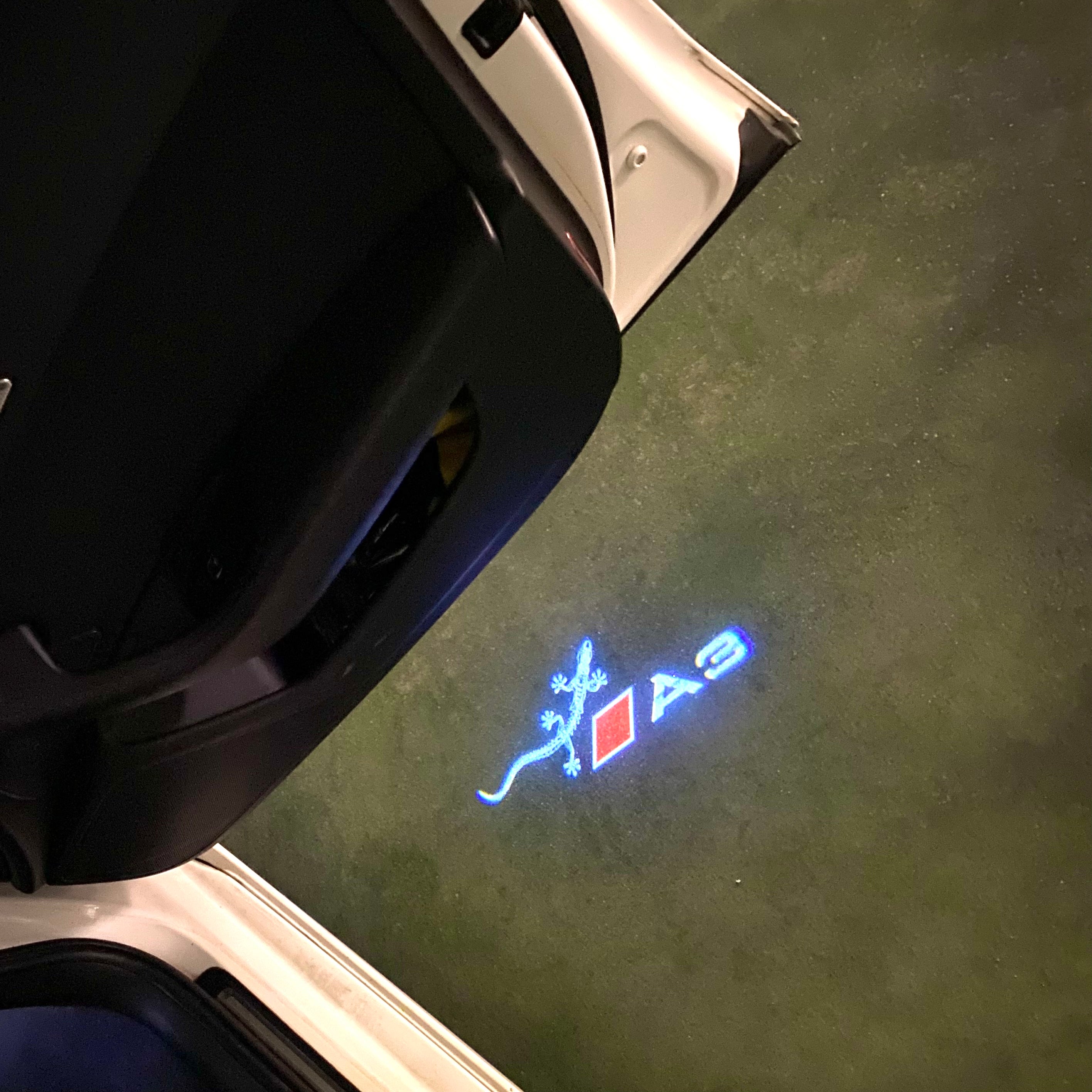 AUDI LOGO PROJECTOT LIGHTS Nr.120 (الكمية 1 = 2 Logo Films /2 أضواء الباب)