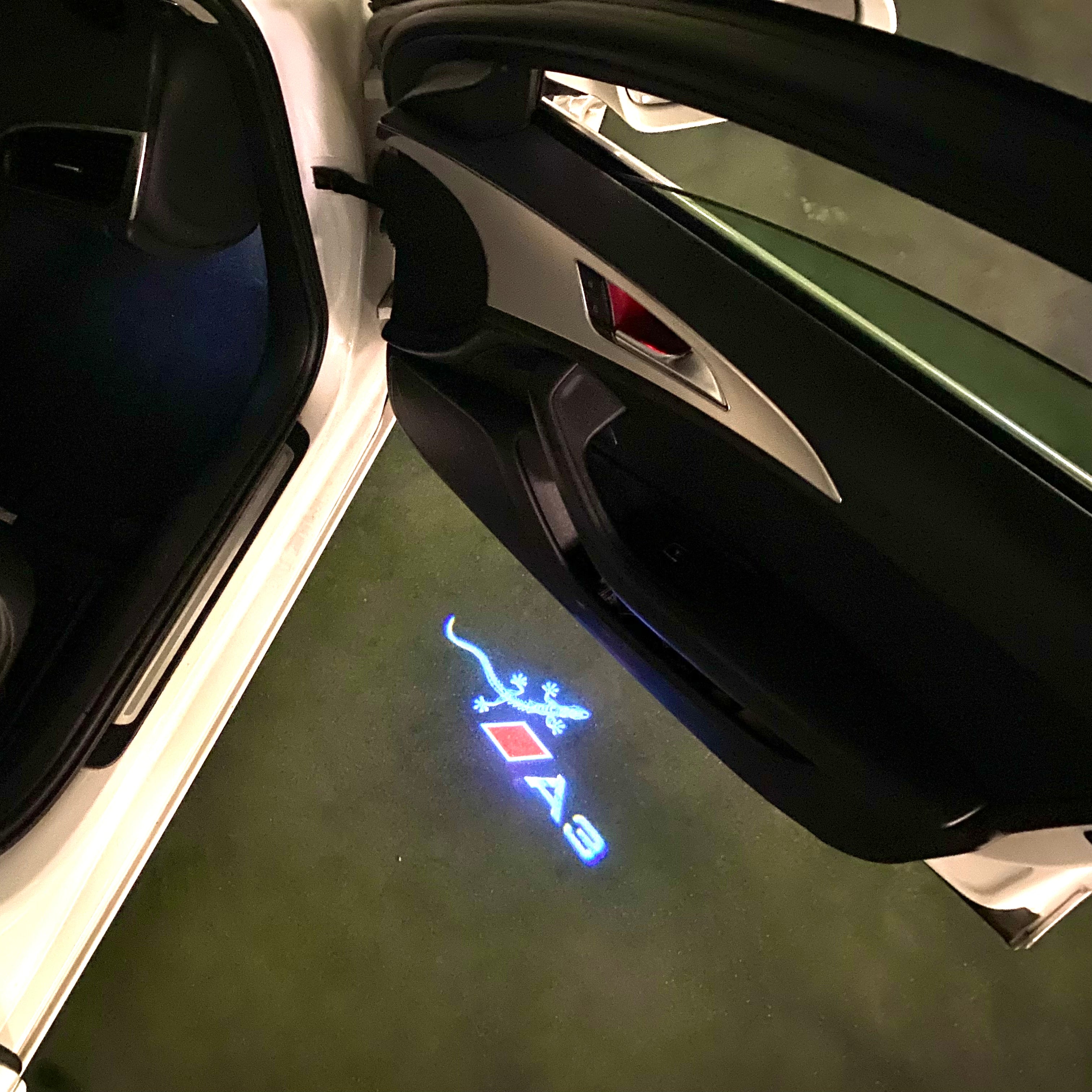 AUDI LOGO PROJECTOT LIGHTS Nr.120 (الكمية 1 = 2 Logo Films /2 أضواء الباب)
