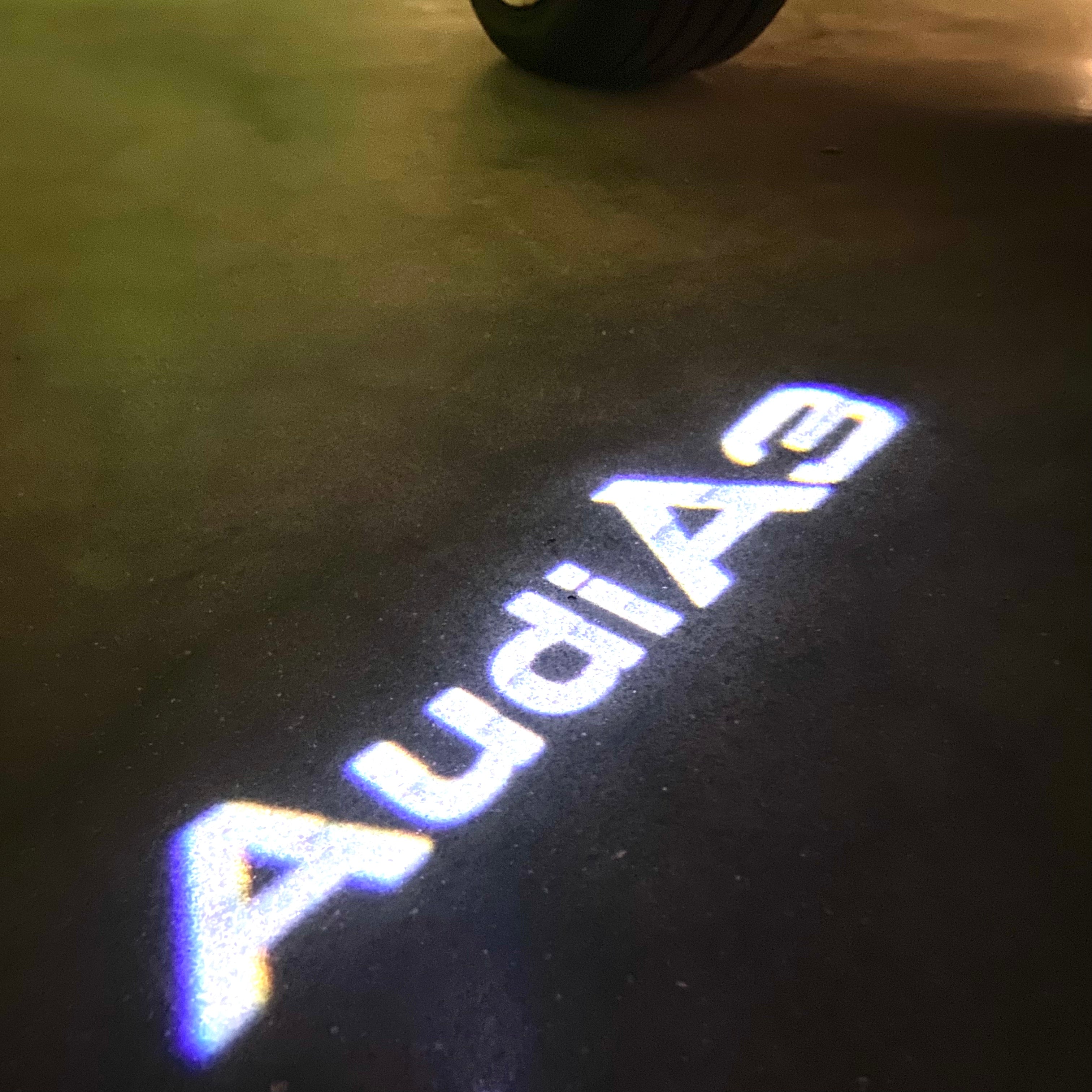 AUDI LOGO PROJECTOT LIGHTS Nr.120 (quantité 1 = 2 Logo Films /2 feux de porte)