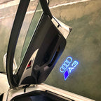 AUDI LOGO PROJECTOT LIGHTS Nr.120 (الكمية 1 = 2 Logo Films /2 أضواء الباب)