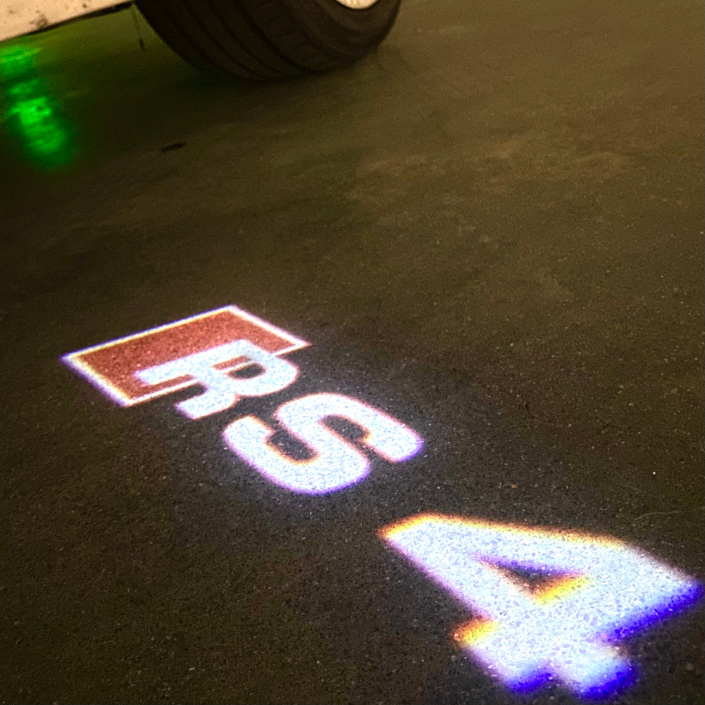 AUDI LOGO PROJECTOT LIGHTS Nr.53 (Menge 1 = 2 Logofolien /2 Türleuchten)