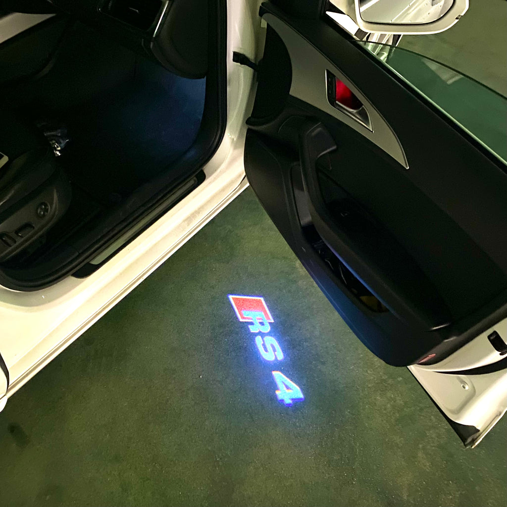 AUDI LOGO PROJECTOT LIGHTS Nr.53 (Menge 1 = 2 Logofolien /2 Türleuchten)