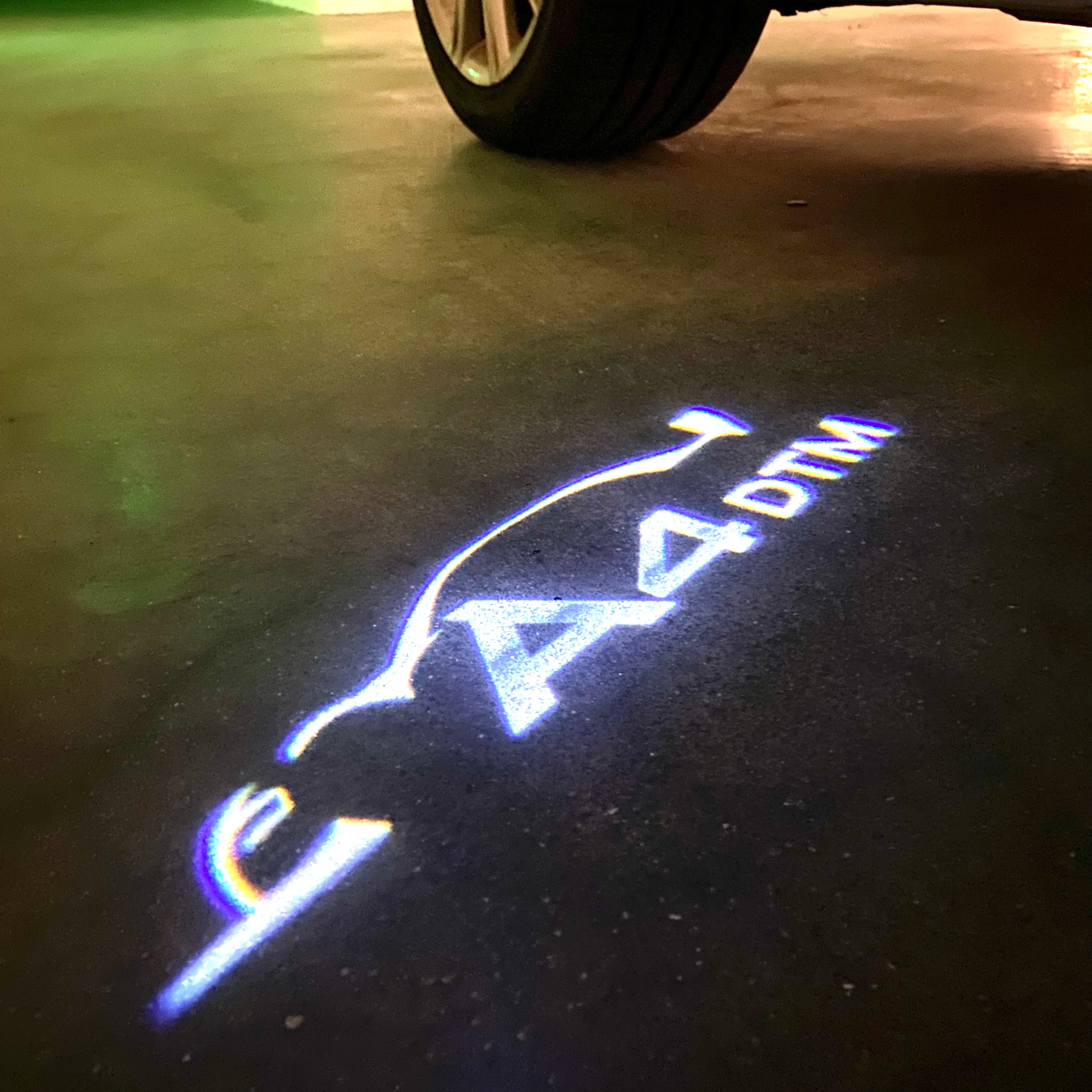 AUDI LOGO PROJECTOT LIGHTS Nr.120 (الكمية 1 = 2 Logo Films /2 أضواء الباب)