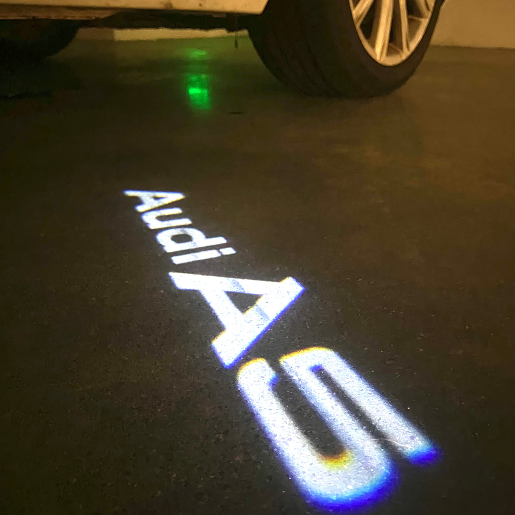 AUDI LOGO PROJECTOT LIGHTS Nr.120 (الكمية 1 = 2 Logo Films /2 أضواء الباب)