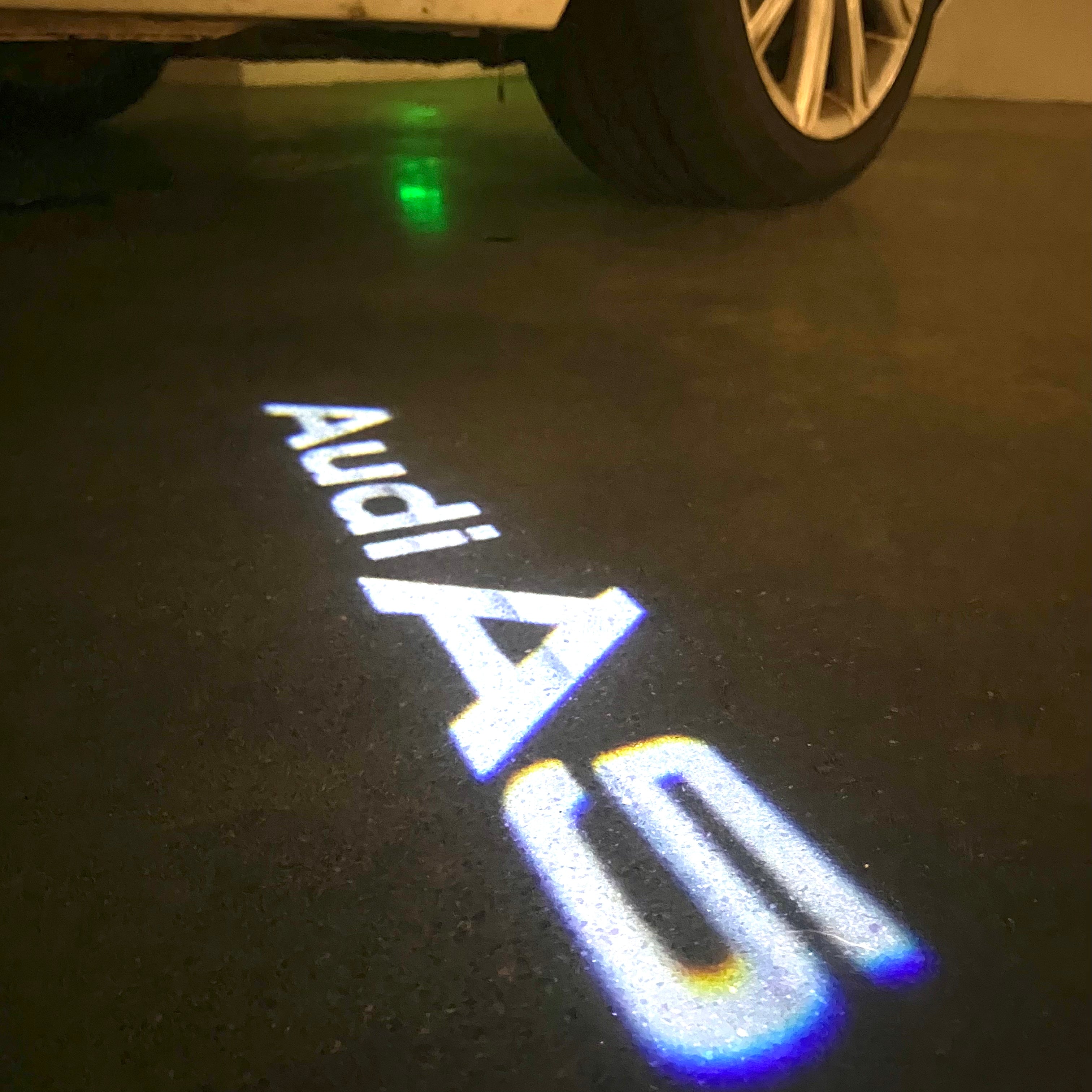 AUDI  A5 LOGO PROJECTOT LIGHTS  (quantity 1 = 2 Logo Films /2 door lights）Nr.12B78