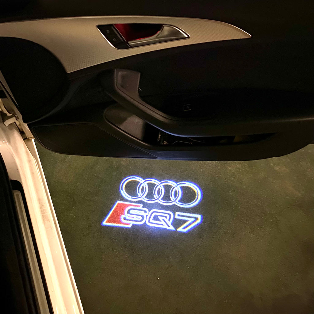 AUDI LOGO PROJECTOT LIGHTS Nr.120 (الكمية 1 = 2 Logo Films /2 أضواء الباب)