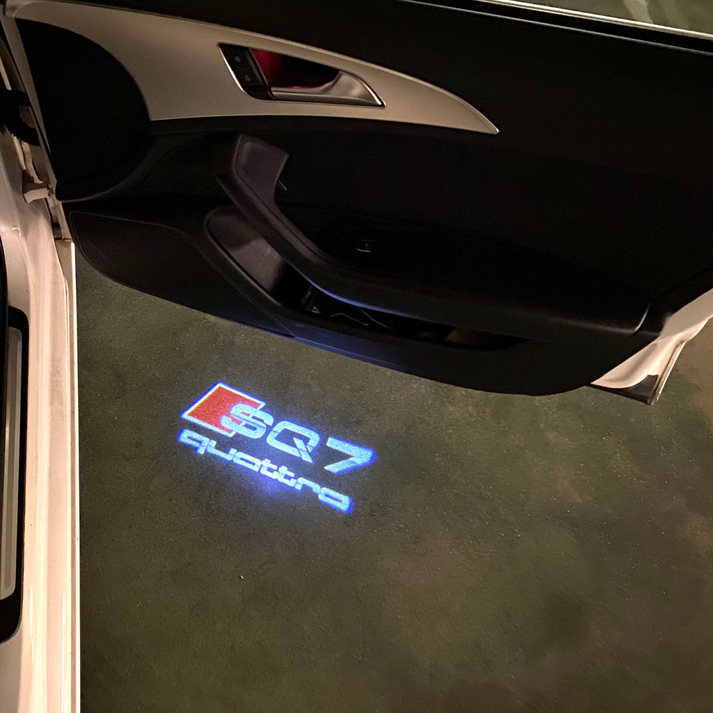 AUDI LOGO PROJECTOT LIGHTS Nr.120 (الكمية 1 = 2 Logo Films /2 أضواء الباب)