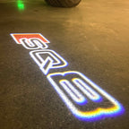 AUDI LOGO PROJECTOT LIGHTS Nr.120 (الكمية 1 = 2 Logo Films /2 أضواء الباب)