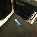 AUDI LOGO PROJECTOT LIGHTS Nr.120 (الكمية 1 = 2 Logo Films /2 أضواء الباب)