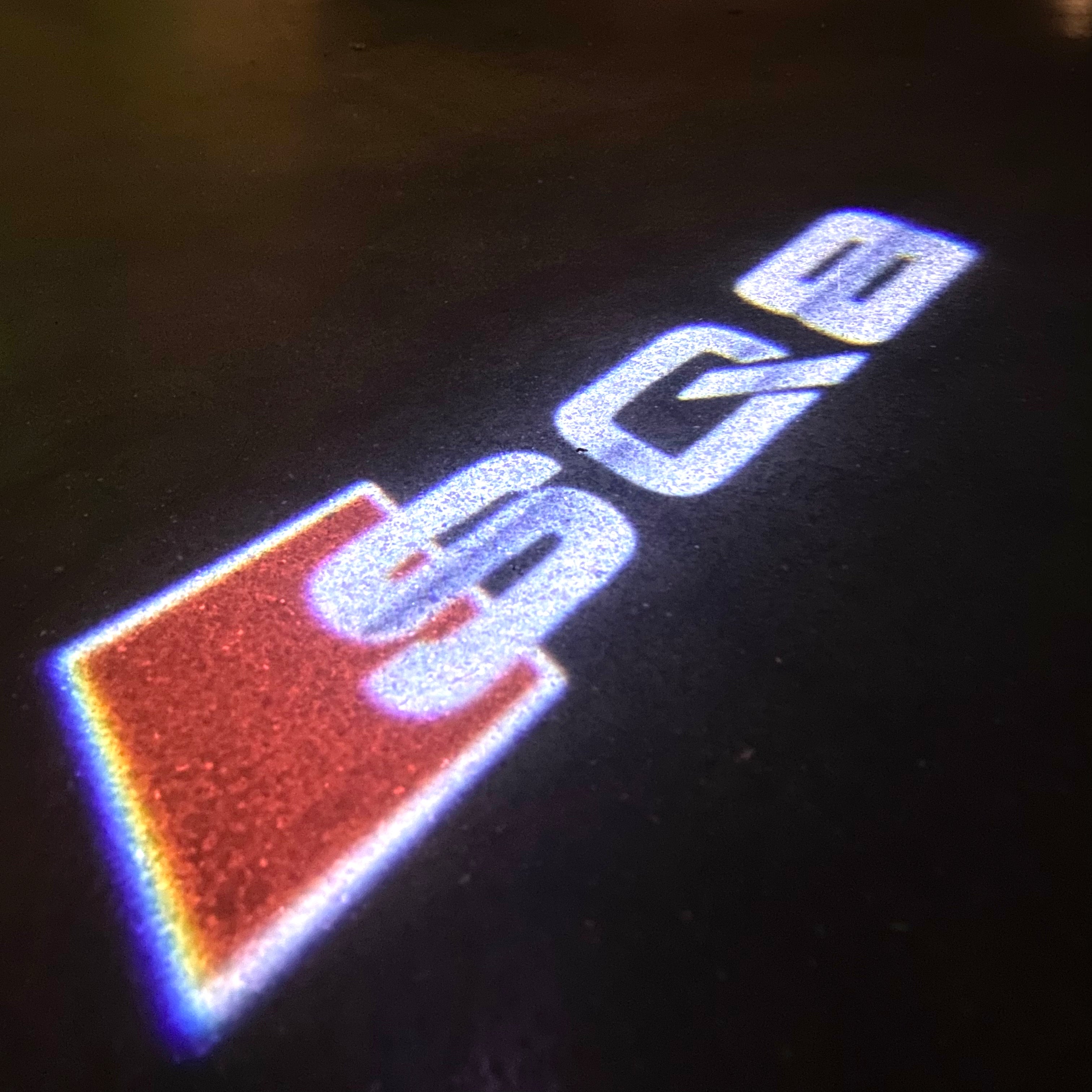 AUDI LOGO PROJECTOT LIGHTS Nr.120 (الكمية 1 = 2 Logo Films /2 أضواء الباب)