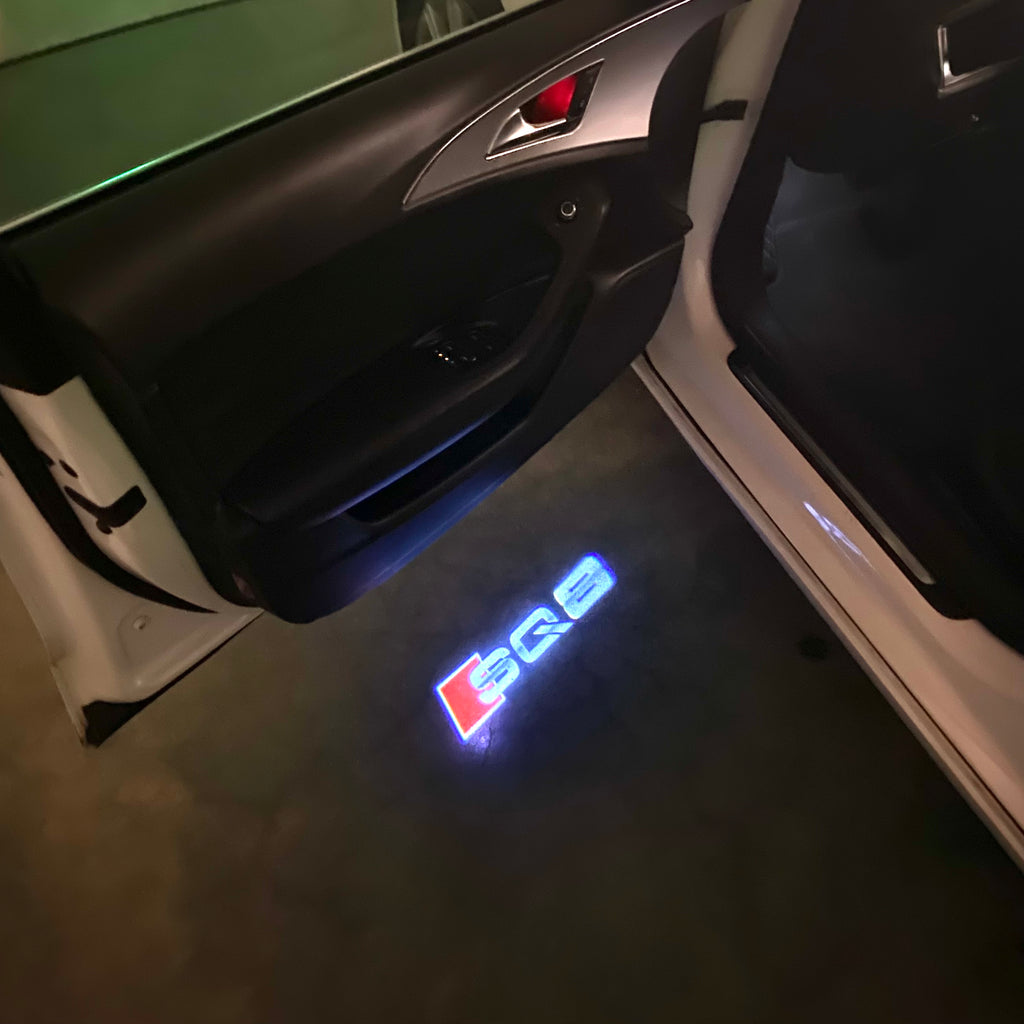 AUDI LOGO PROJECTOT LIGHTS Nr.120 (الكمية 1 = 2 Logo Films /2 أضواء الباب)