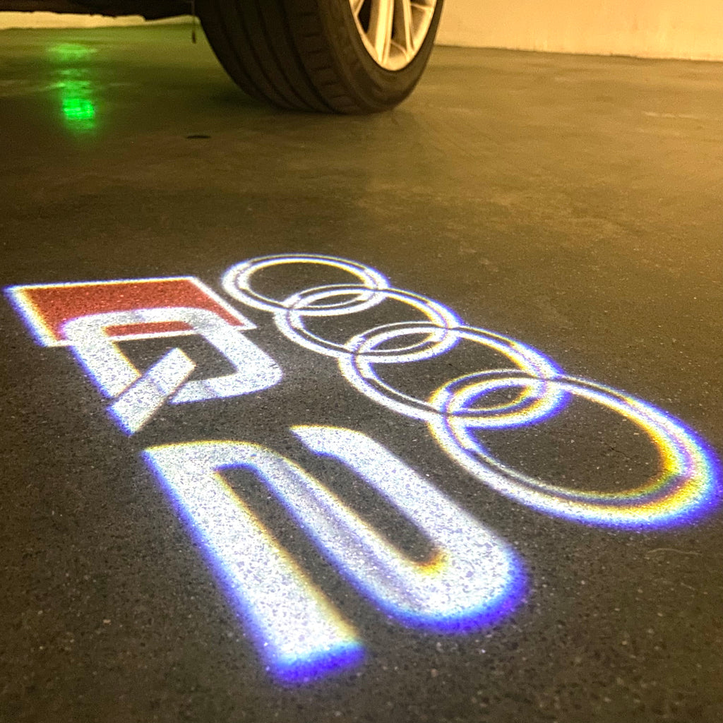 AUDI LOGO PROJECTOT LIGHTS Nr.120 (الكمية 1 = 2 Logo Films /2 أضواء الباب)