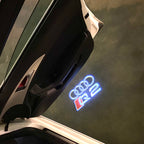 AUDI LOGO PROJECTOT LIGHTS Nr.120 (الكمية 1 = 2 Logo Films /2 أضواء الباب)