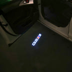 AUDI LOGO PROJECTOT LIGHTS Nr.120 (الكمية 1 = 2 Logo Films /2 أضواء الباب)