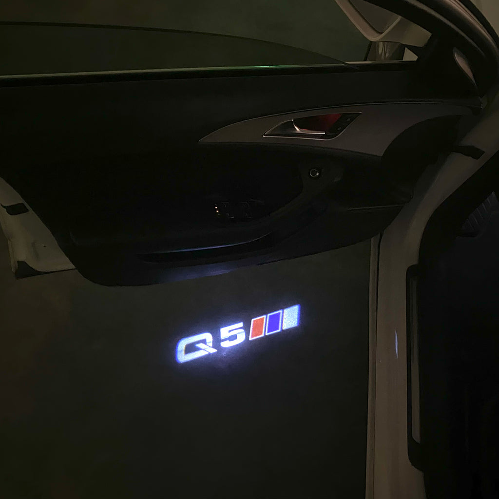 AUDI LOGO PROJECTOT LIGHTS Nr.120 (الكمية 1 = 2 Logo Films /2 أضواء الباب)