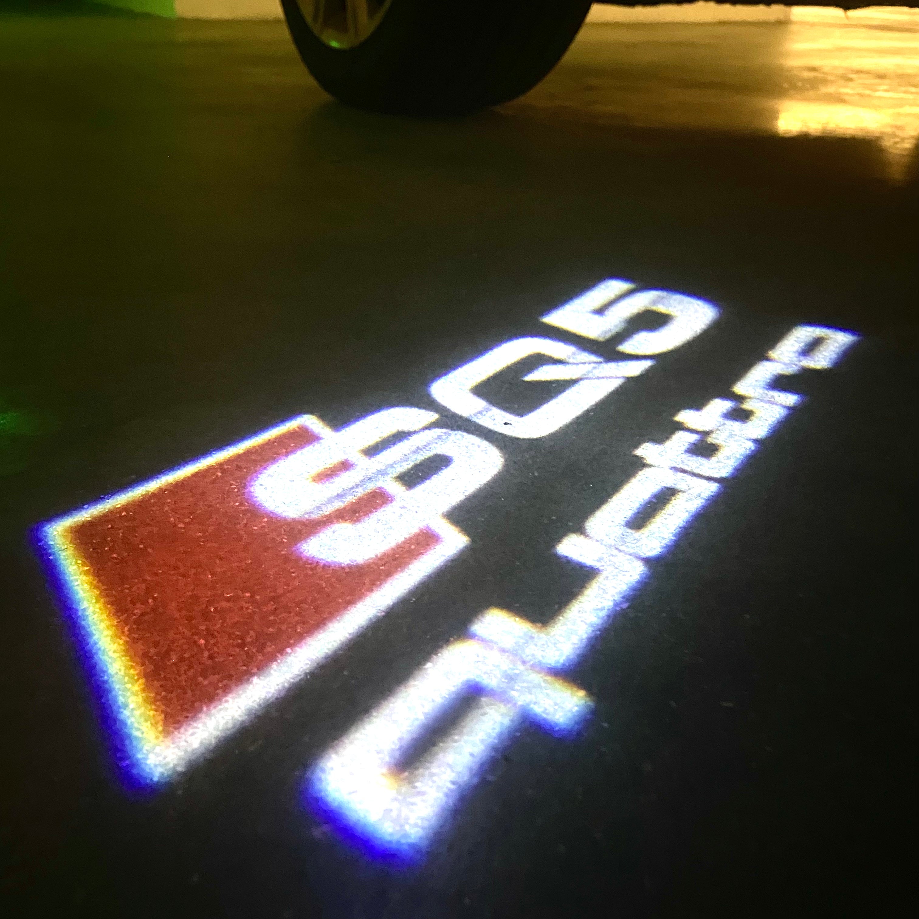 AUDI  SQ5 LOGO PROJECTOT LIGHTS  (quantity 1 = 2 Logo Films /2 door lights）Nr.12B30