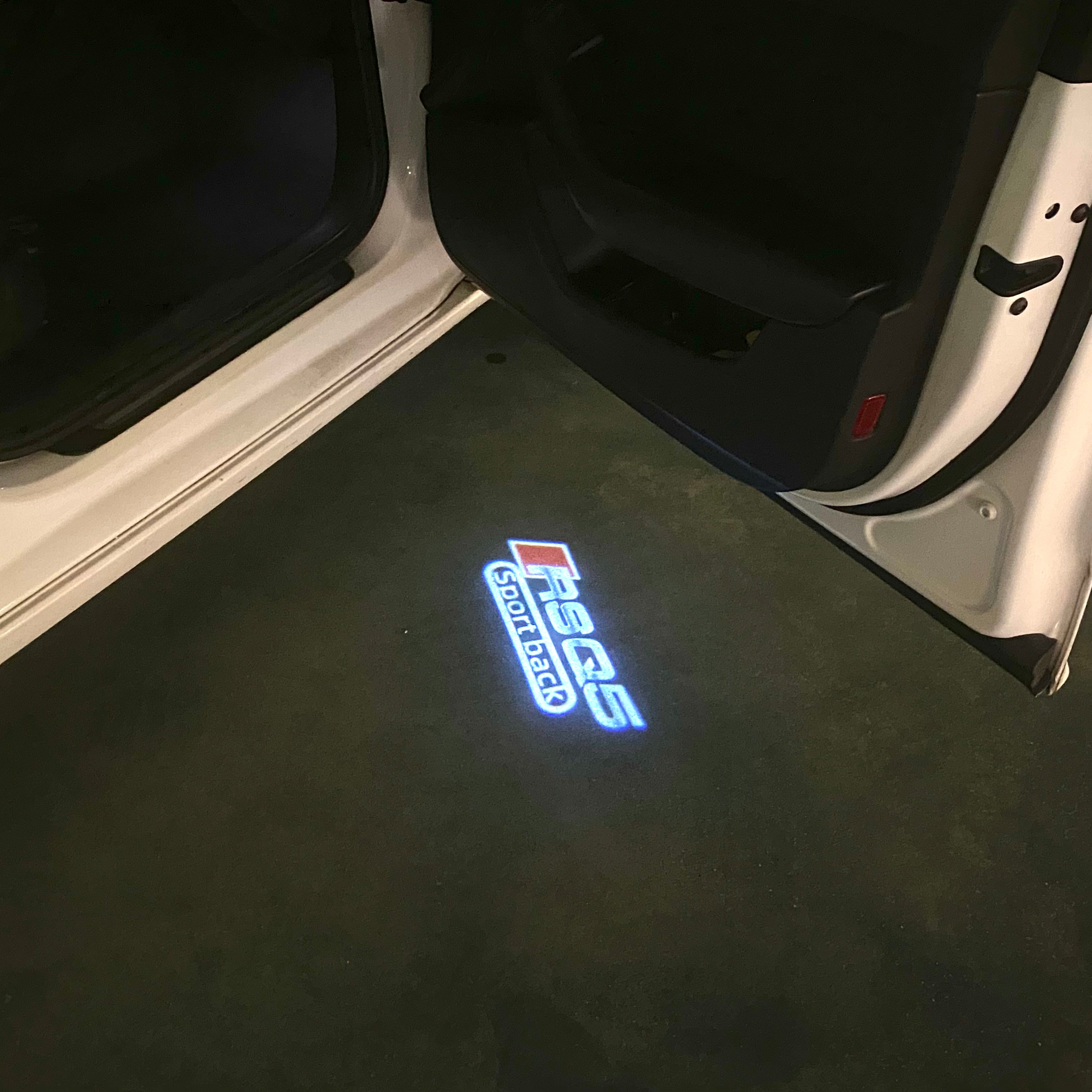 AUDI  RSQ5 LOGO PROJECTOT LIGHTS  (quantity 1 = 2 Logo Films /2 door lights）Nr.12B76