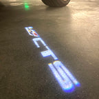 CADILLAC CTS LOGO PROJECTOT LIGHTS Nr.9799 (quantity 1 = 2 Logo Films /2 door lights）