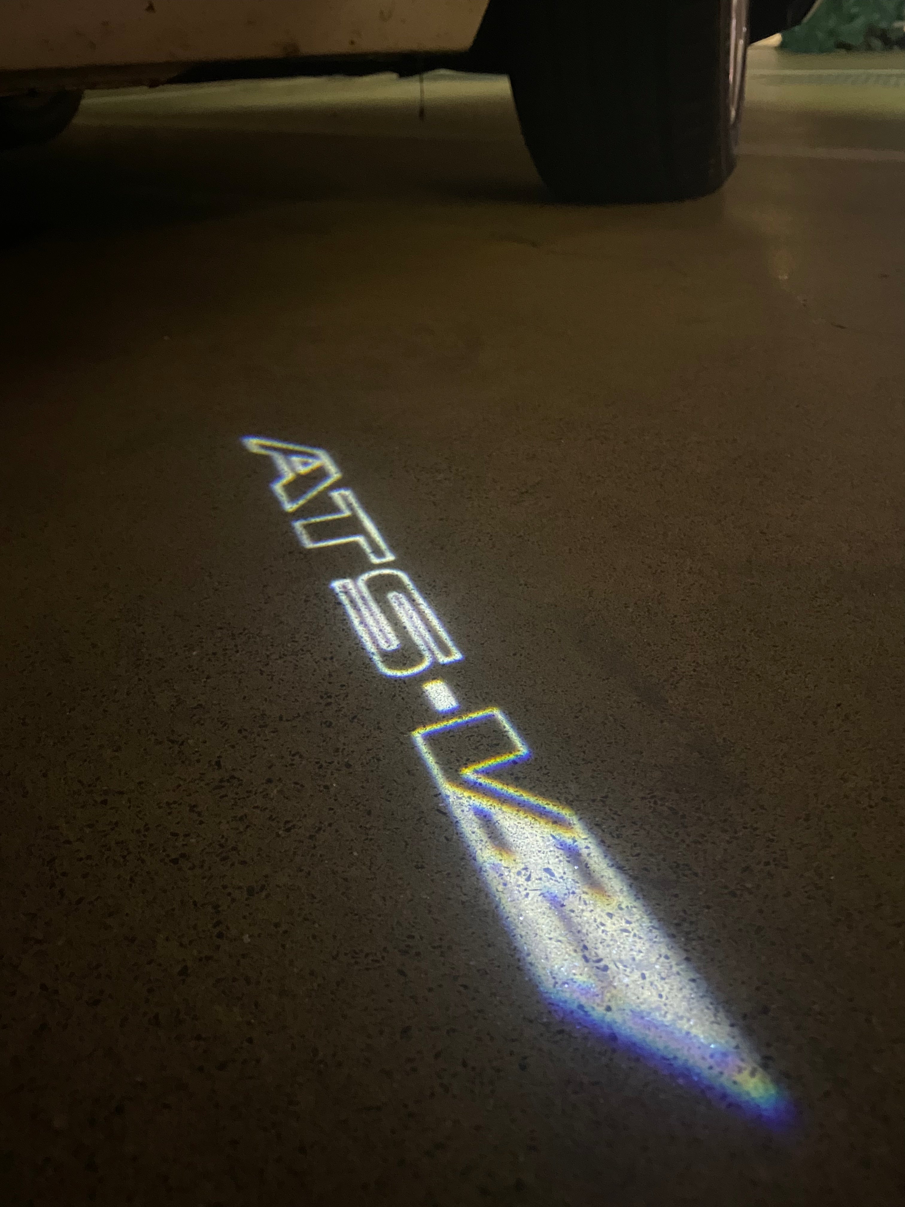 CADILLAC ATS LOGO PROJECTOT LIGHTS Nr.9783 (quantity 1 = 2 Logo Films /2 door lights）