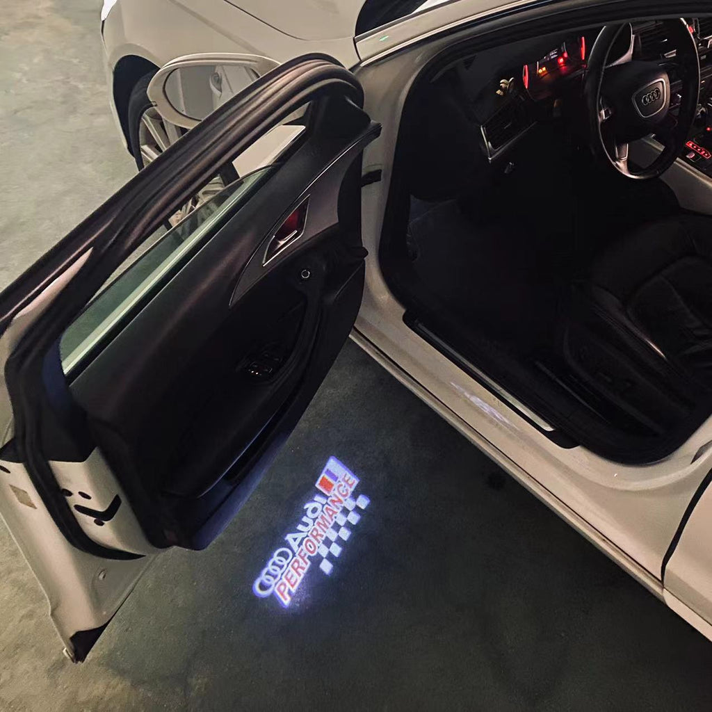 AUDI LOGO PROJECTOT LIGHTS Nr.120 (الكمية 1 = 2 Logo Films /2 أضواء الباب)