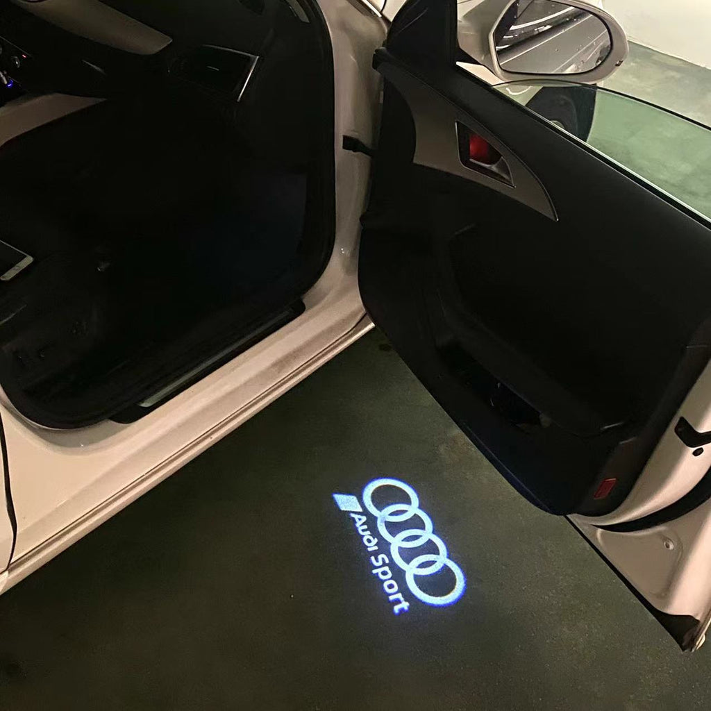 AUDI LOGO PROJECTOT LIGHTS Nr.120 (الكمية 1 = 2 Logo Films /2 أضواء الباب)