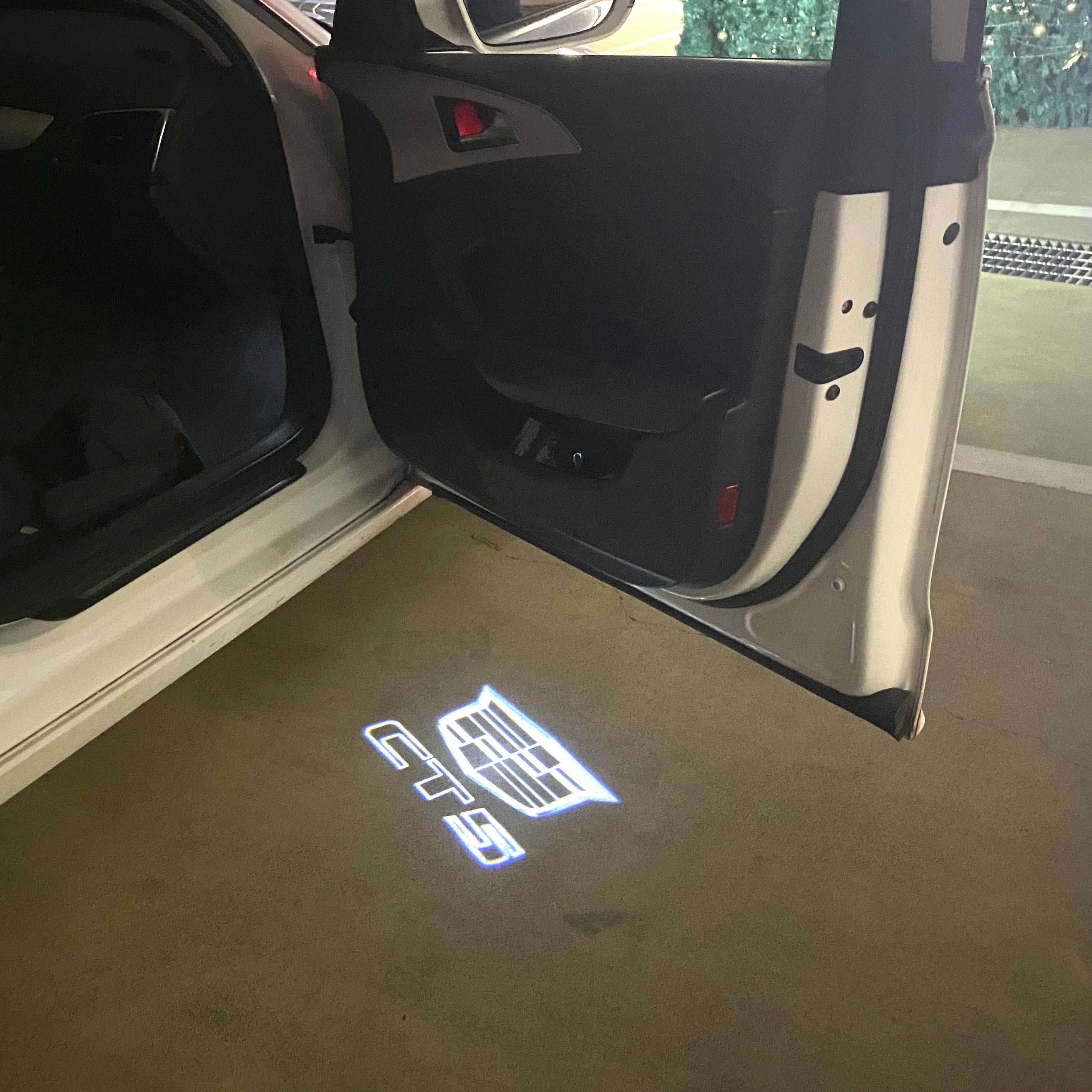 CADILLAC CTS LOGO PROJECTOT LIGHTS Nr.9734 (quantity 1 = 2 Logo Films /2 door lights）