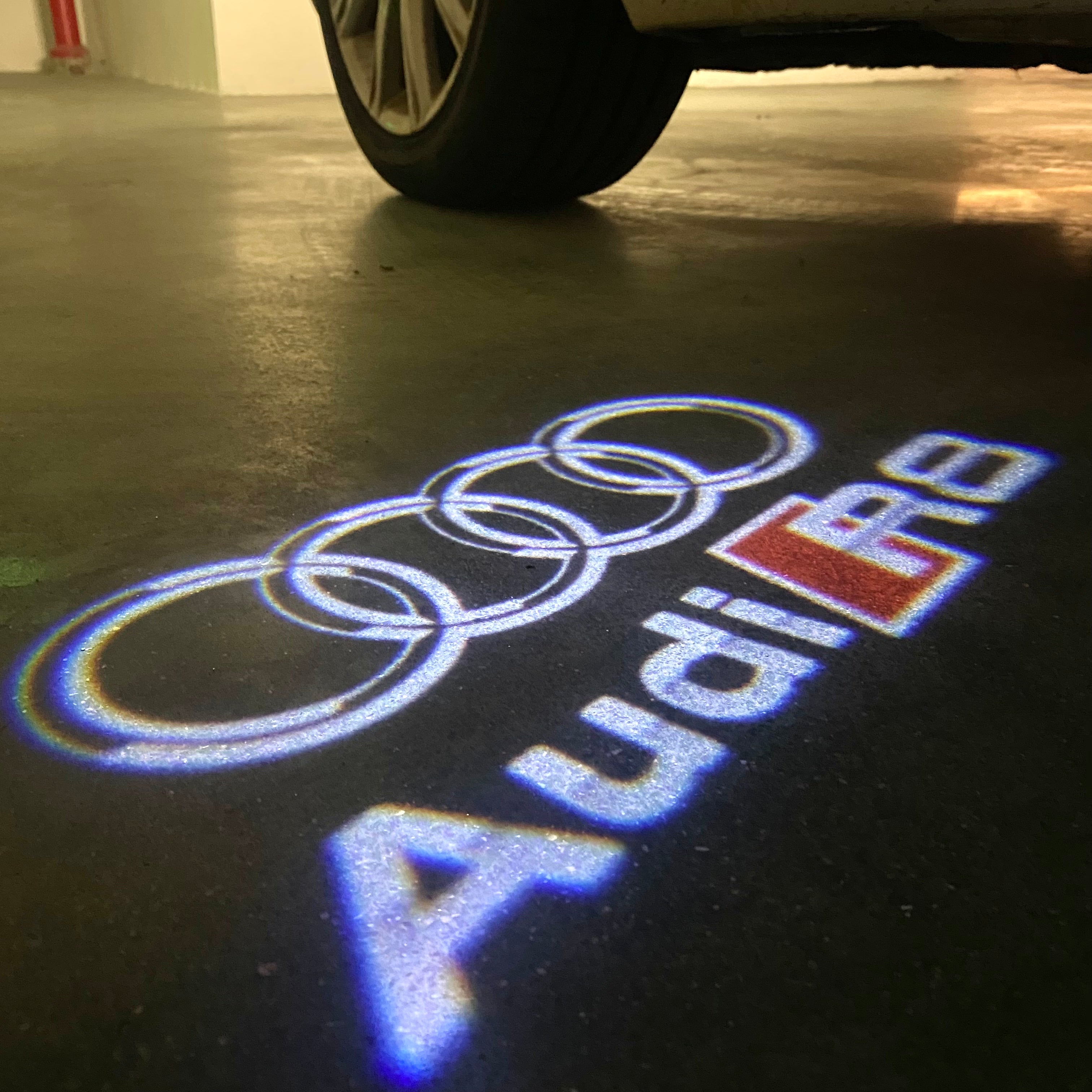 AUDI LOGO PROJECTOT LIGHTS Nr.120 (الكمية 1 = 2 Logo Films /2 أضواء الباب)