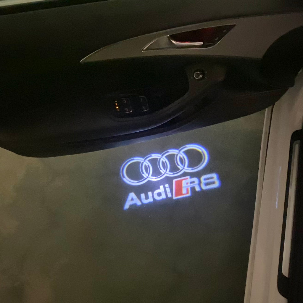 AUDI LOGO PROJECTOT LIGHTS Nr.120 (الكمية 1 = 2 Logo Films /2 أضواء الباب)