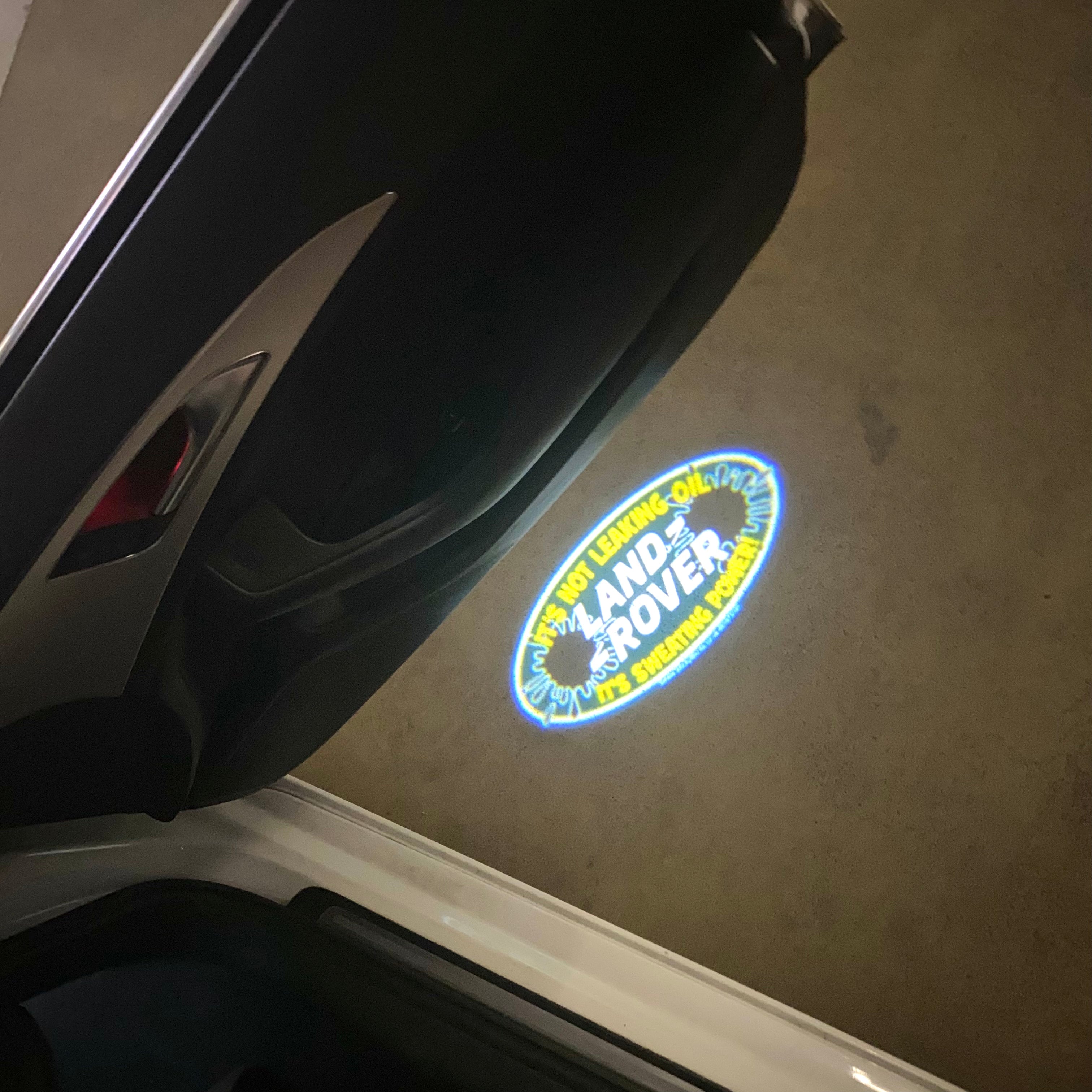 Land Rover  ORIGINAL  LOGO PROJECROTR LIGHTS Nr.1106 (quantity 1 = 1 sets/2 door lights)