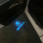 SKODA ORIGINAL LOGO PROJECTOT LIGHTS Nr.867(quantity  1 =  2 Logo Film /  2 door lights)