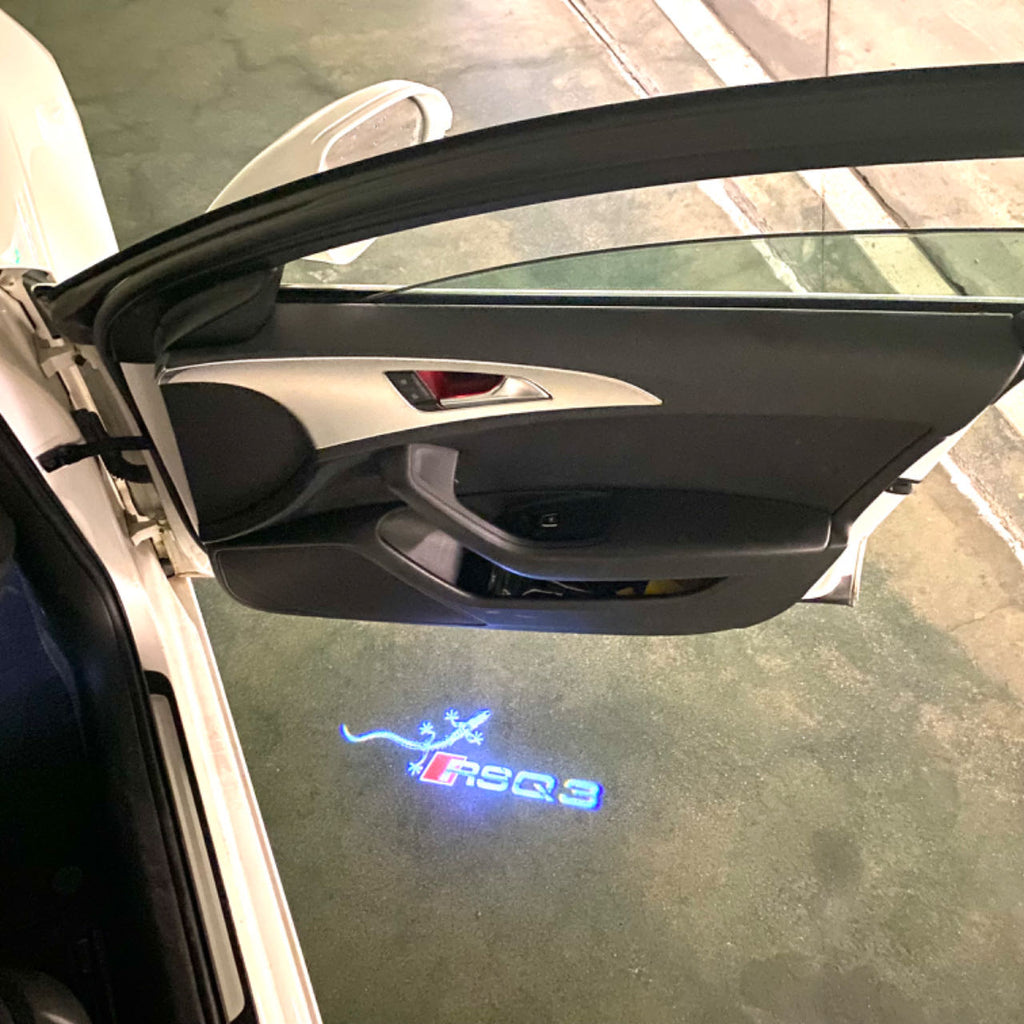 AUDI LOGO PROJECTOT LIGHTS Nr.120 (الكمية 1 = 2 Logo Films /2 أضواء الباب)