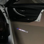 ÉCLAIRAGE DE PROJECTEUR BMW M3 LOGO Nr.24 (quantité 1 = 1 jeux / 2 feux de porte)