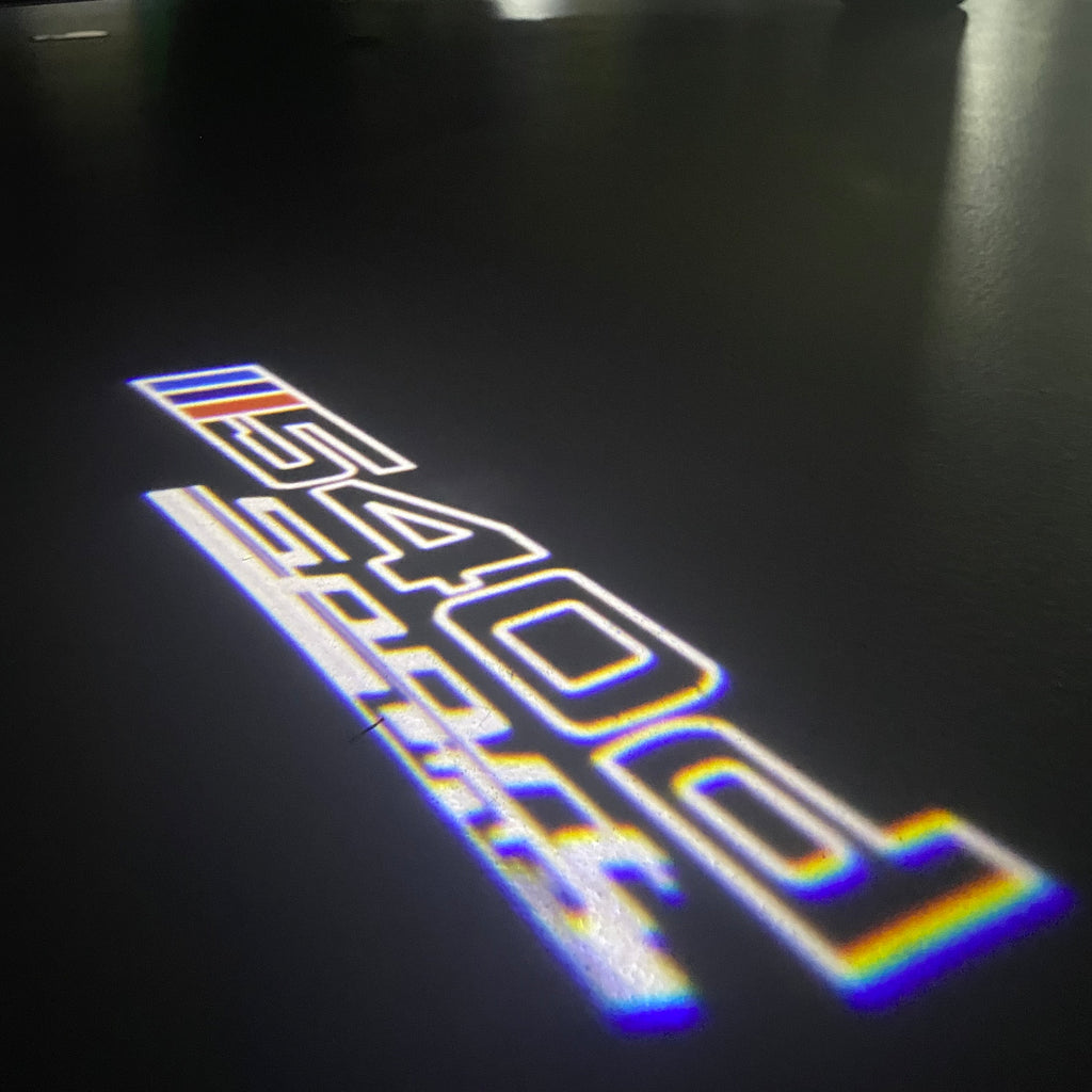 BMW M3 LOGO PROJECTOR LIGHTS Nr.24 (الكمية 1 = 1 مجموعة / 2 أضواء باب)