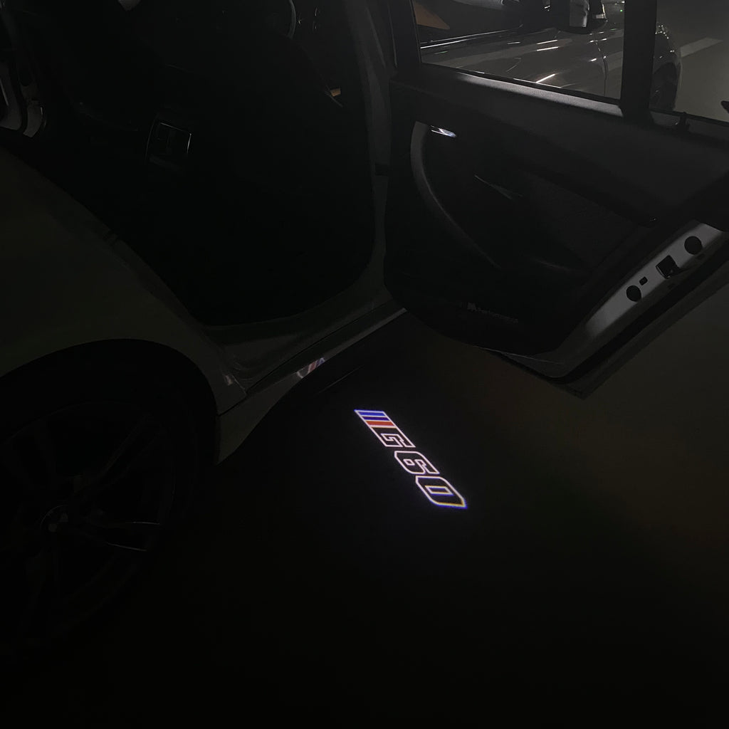 BMW M3 LOGO PROJECTOR LIGHTS Nr.24 (الكمية 1 = 1 مجموعة / 2 أضواء باب)
