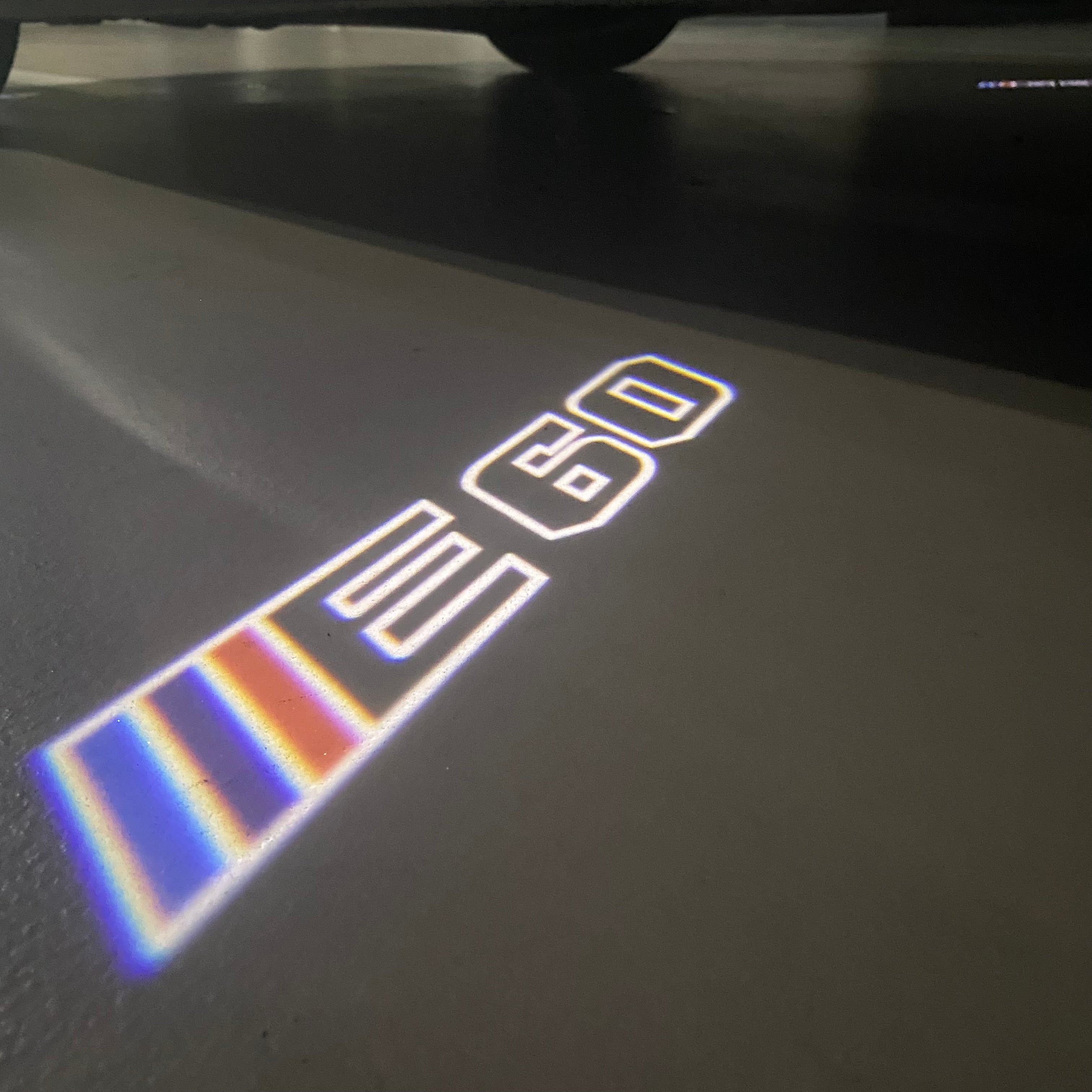BMW  5 SERIES E60   LOGO PROJECTOT LIGHTS (quantity 1 = 1 sets/2 door lights) Nr.6024q87
