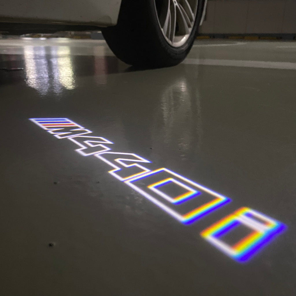 BMW M3 LOGO PROJECTOR LIGHTS Nr.24 (الكمية 1 = 1 مجموعة / 2 أضواء باب)