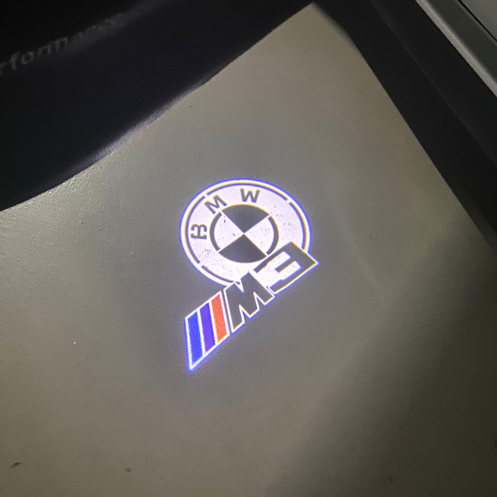 ÉCLAIRAGE DE PROJECTEUR BMW M3 LOGO Nr.24 (quantité 1 = 1 jeux / 2 feux de porte)