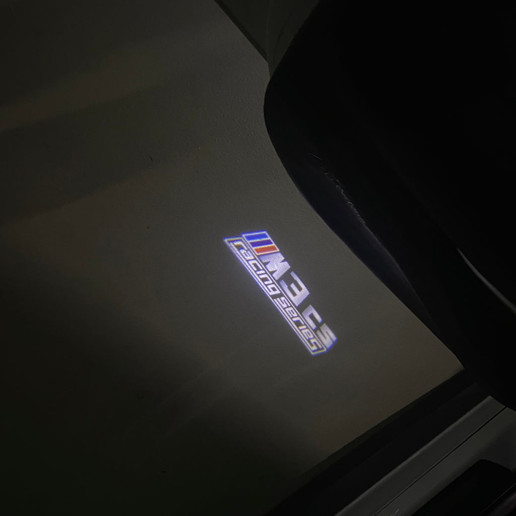 ÉCLAIRAGE DE PROJECTEUR BMW M3 LOGO Nr.24 (quantité 1 = 1 jeux / 2 feux de porte)