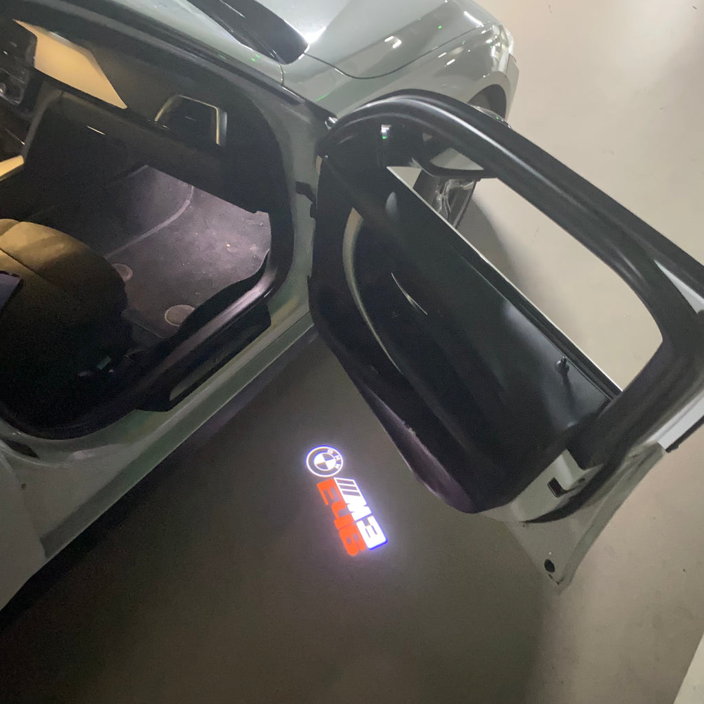 ÉCLAIRAGE DE PROJECTEUR BMW M3 LOGO Nr.24 (quantité 1 = 1 jeux / 2 feux de porte)