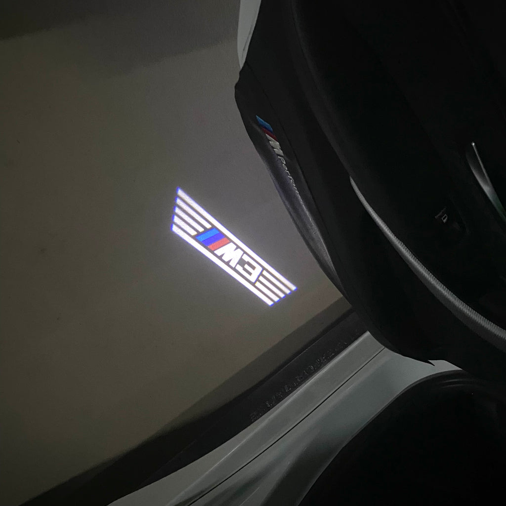 ÉCLAIRAGE DE PROJECTEUR BMW M3 LOGO Nr.24 (quantité 1 = 1 jeux / 2 feux de porte)