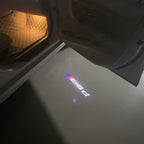 ÉCLAIRAGE DE PROJECTEUR BMW M3 LOGO Nr.24 (quantité 1 = 1 jeux / 2 feux de porte)
