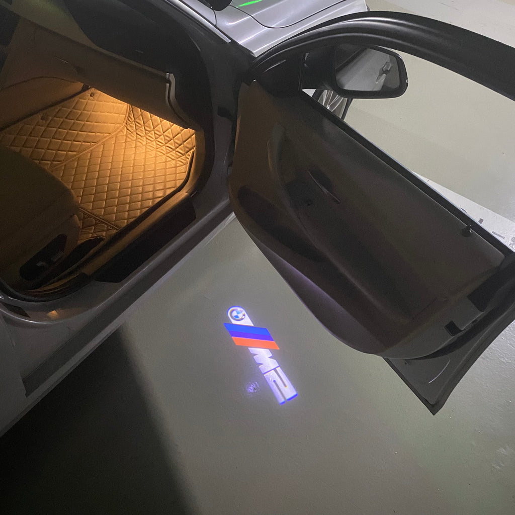 ÉCLAIRAGE DE PROJECTEUR BMW M3 LOGO Nr.24 (quantité 1 = 1 jeux / 2 feux de porte)